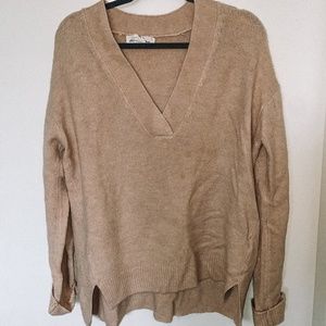 Tan sweater.